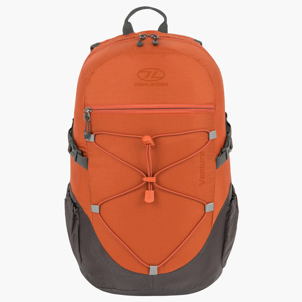A 20-liter orange and gray Highlander Venture backpack with a mesh padded back system and a front loading bungee cord.